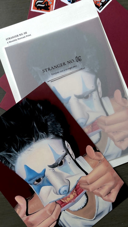 A close-up of printed artwork or packaging featuring a stylized portrait with a face obscured by a hand, overlaid with a white card labeled 'STRANGER NO. 06'.
