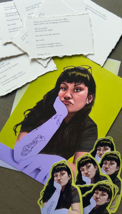 A collage-style art print or poster featuring a stylized portrait of a woman with dark hair, glasses, and a purple hand, surrounded by torn white paper snippets and repeated face cutouts on a tabletop.